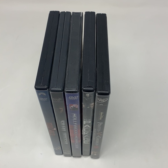 5 DVD movies 🎥 used, iron man, pirates of the Caribbean, the package & more - Picture 9 of 11